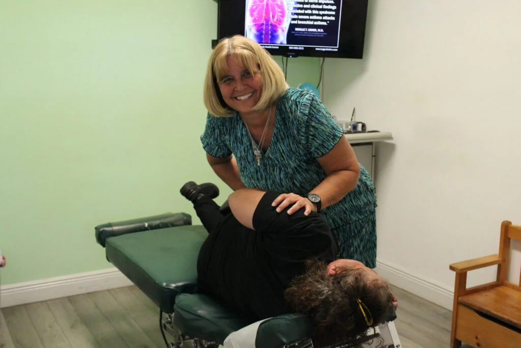 Dr. Jacqueline caring for a patient